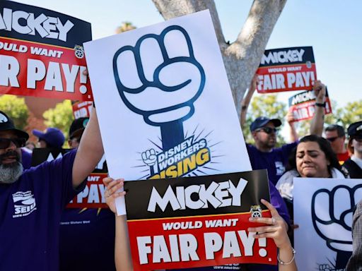 Thousands of Disneyland workers vote to authorize a potential strike. It would be the first in 40 years