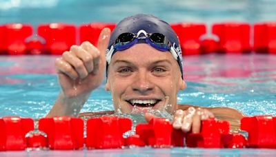 With French fans cheering every stroke, Marchand cruises to fastest time in men's medley