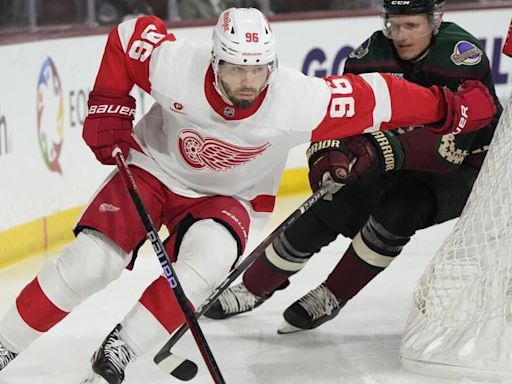 The Sharks acquire Jake Walman and a 2nd-round draft pick from the Red Wings