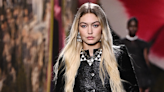 Gigi Hadid walks the Chanel runway in head-to-toe sparkles and *very* unexpected footwear