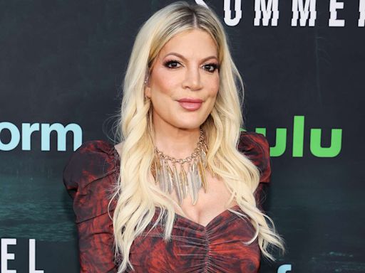Tori Spelling Reveals She Got Her First Breast Implants at a Strip Mall at Age 19: 'I Think They're Okay Now'
