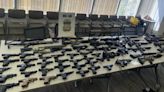 Authorities arrest man for having more than 60 unregistered firearms