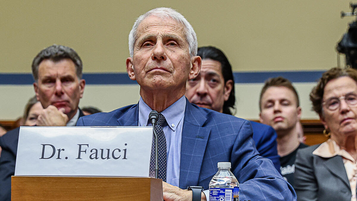 Man Who Sat Behind Dr. Fauci Making Faces During House Hearing Identified | iHeart