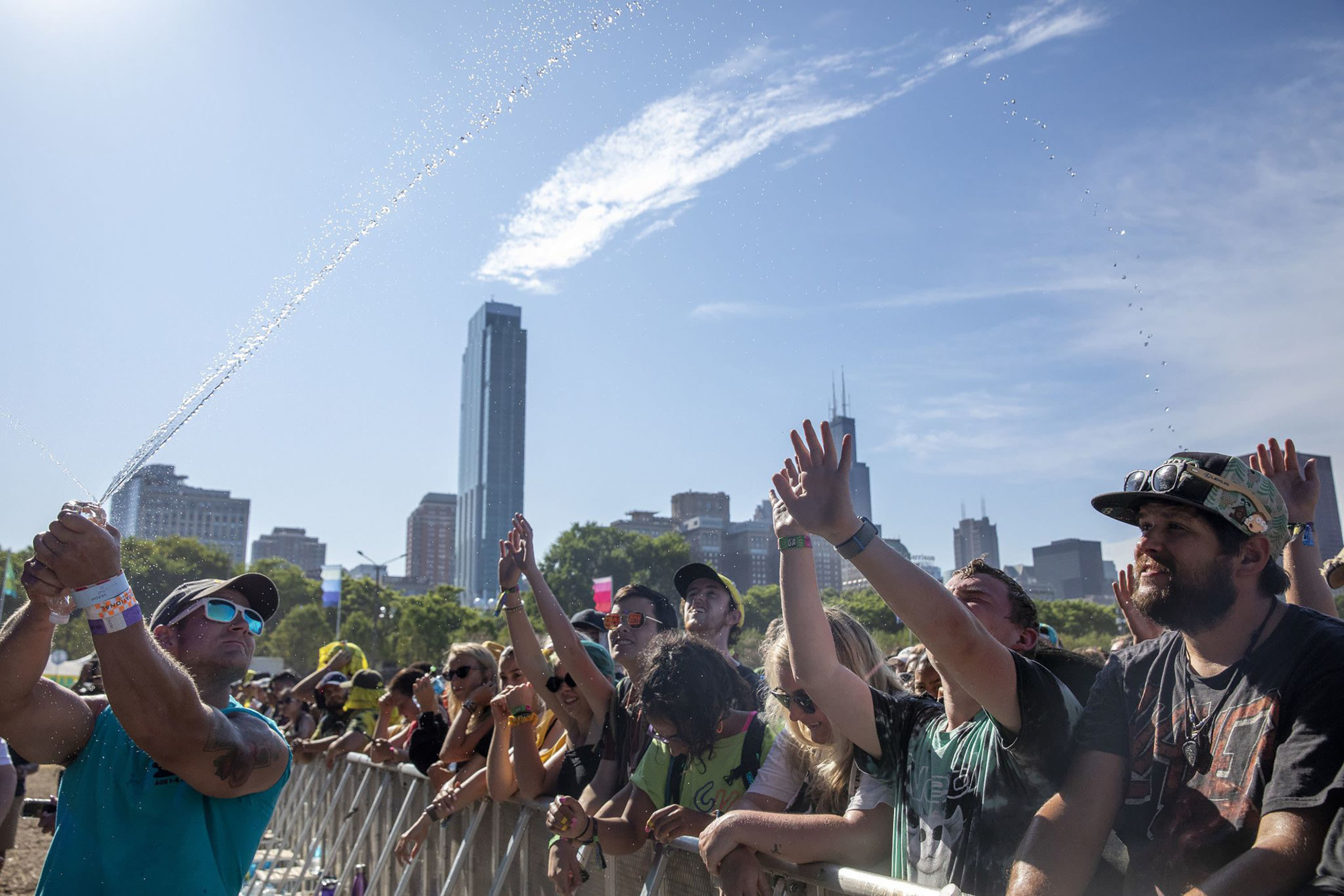 With storms and heat forecast for Lollapalooza, music festivals consider how to adapt to climate change