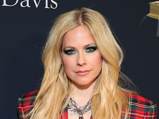 Avril Lavigne doesn't hold back as she talks cheating exes and rocky love life
