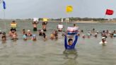 Swimmers perform yoga at Triveni Sangam in Prayagraj ahead of International Yoga Day