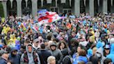 Georgian lawmakers approve a divisive foreign influence bill that has sparked weeks of protests