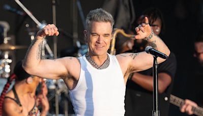 Headliner Robbie Williams' dancer grabs his bottom at BST Hyde Park