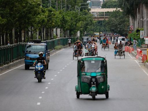 Bangladesh factories, banks reopen as curfew is eased after protests taper off