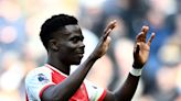 Saka shares relief as Arsenal hold off Spurs fightback