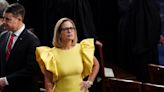 Sen. Kyrsten Sinema is known for her eccentric outfits in Congress. Here are 10 of her boldest looks.