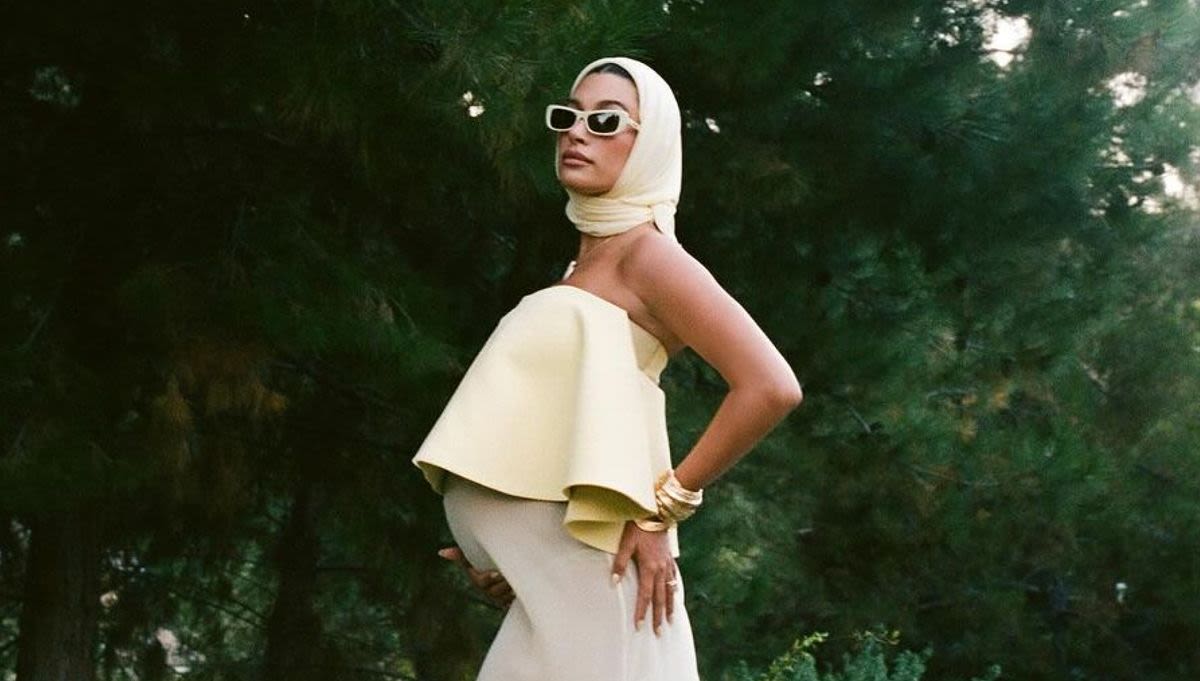 Hailey Bieber Wears a Butter Yellow Naked Dress to Her Baby Shower