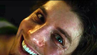 Lukas Gage twists face into disturbing grin in bloody “Smile 2” preview