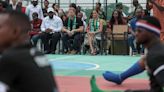 ‘We love you’: Harry plays volleyball with army veterans as he and Meghan get warm welcome in Nigeria
