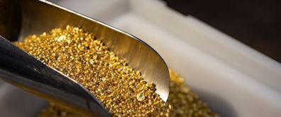 Gold rises as yields slip after US data lifts rate-cut hopes