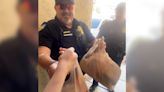 Watch as Phoenix officers complete a DoorDash order after delivery driver gets arrested