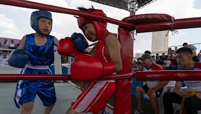 AP PHOTOS: A 12-year-old in Mongolia finds joy in boxing and now dreams of the Olympics