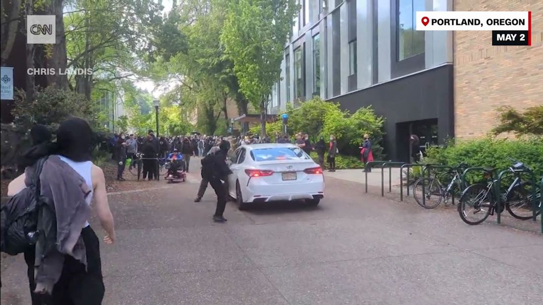 Man drives car towards crowd at Portland State University, uses pepper spray - CNN Video