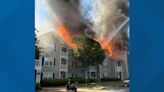 Firefighters battle flames at Woodstock apartment complex