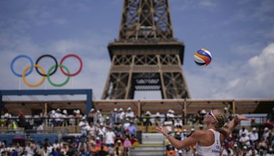 At the Olympic beach volleyball venue, the Eiffel Tower stars in a très French show