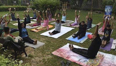 Delhi’s Yogshala scheme stalled, but tutors still bending over backwards to teach yoga