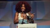 SZA Accepts Her Songwriting Flowers In A Corset Dress That Screams ‘Marie Antoinette’