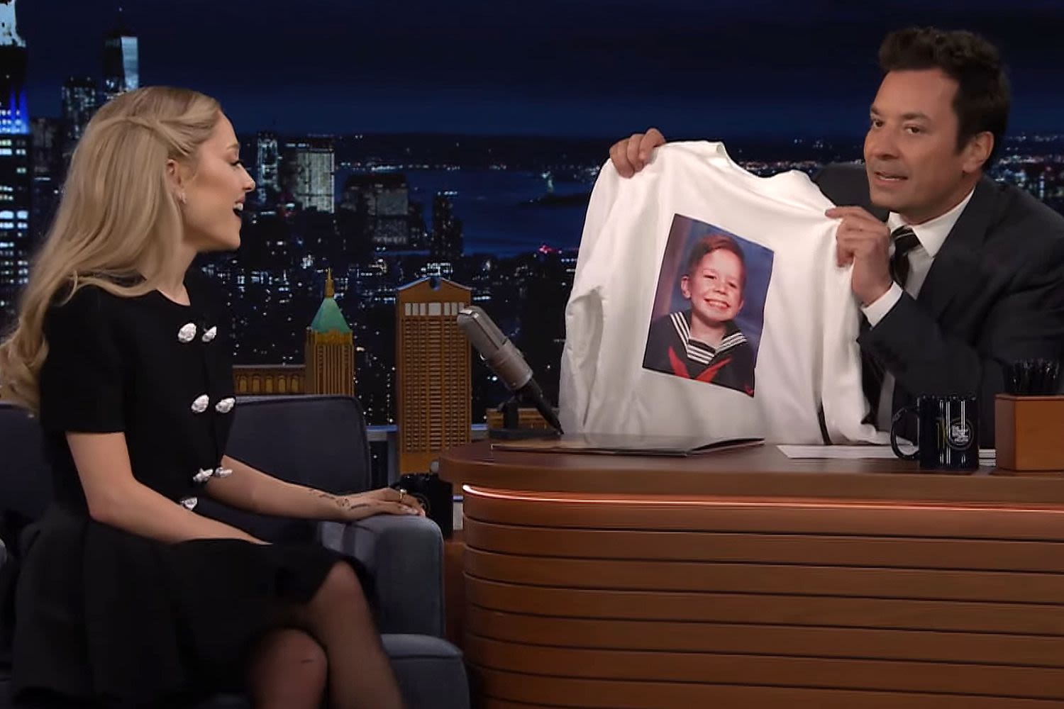 Jimmy Fallon Gifts Ariana Grande a Sweatshirt with His Baby Photo on It: ‘I’m Gonna Cherish This’