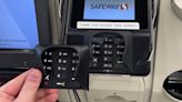 Credit card info-swiping device is pulled off self-checkout by shopper