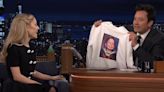 Jimmy Fallon Gifts Ariana Grande a Sweatshirt with His Baby Photo on It: ‘I’m Gonna Cherish This’