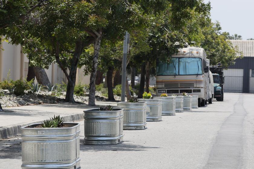 Did Home Depot staff bolt planters to an L.A. street to deter RV parking? The city is investigating