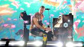 Chris Martin pauses Coldplay concert to design tattoo for mega fan in crowd