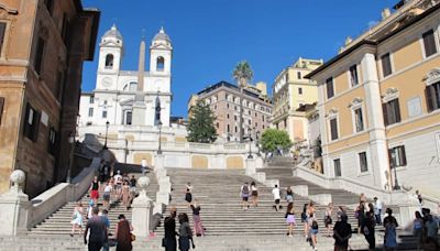Italian femicide activists paint Rome's Spanish Steps red