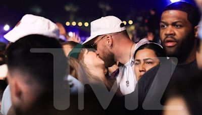 Taylor Swift and Travis Kelce Share a Kiss in the Middle of Crowd at 2024 Coachella Festival