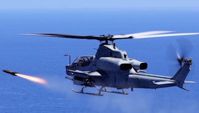 A US Marine Corps attack helicopter fired off a new 'fire and forget' missile for the first time in the Pacific, striking a moving vessel