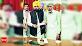 Punjab CM Bhagwant Mann hands over Rs 1 crore cheque to Shubhkaran Singh's family | Chandigarh News - Times of India