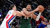 Giannis has a triple-double and Middleton passes 'Big Dog' as Bucks beat Pistons 122-113