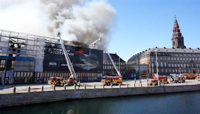 Copenhagen fights the last pockets of a fire that destroyed a 400-year-old landmark