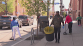 South Side business owners clean up streets for Earth Day