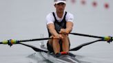 Rowing-Fans upbeat in rain as sculls heats begin