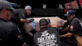 At Memphis BBQ contest, pitmasters sweat through the smoke to be best in pork