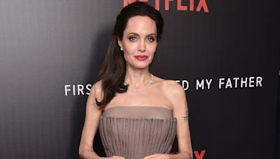 Angelina Jolie wants ex husband Brad Pitt to 'end the fighting'