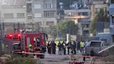 Israel says Hezbollah rocket kills 11 at football ground, vows response