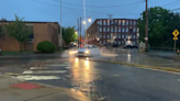 Major flooding closes streets and collapses building in Providence: Governor warns drivers to stay off roads