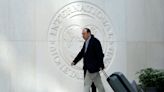 IMF flashes financial risk warnings but urges continued inflation fight