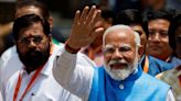 India's Modi denies stoking divisions to win election, files nomination