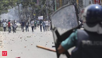 Bangladesh enforces a curfew after days of deadly student protests over government jobs quota - The Economic Times