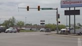 Car crash knocks down traffic light at busy Rapid City intersection