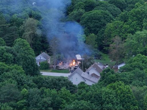 Public warned to stay away amid police standoff with gunman at burning home in Maine