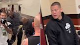 Alternate video shows Nate Diaz and Jake Paul entourages scuffle up close, bodyguard pelted with beer