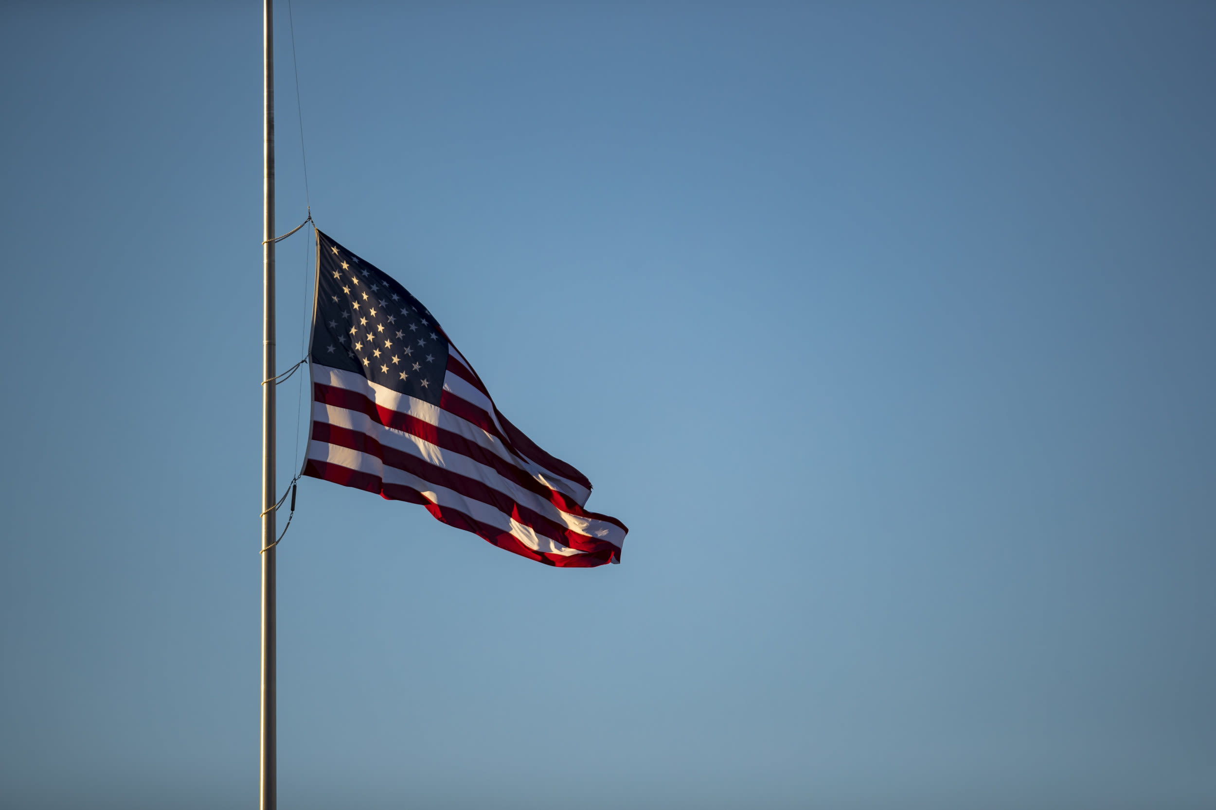 Why flags fly half-staff in four states today, this weekend